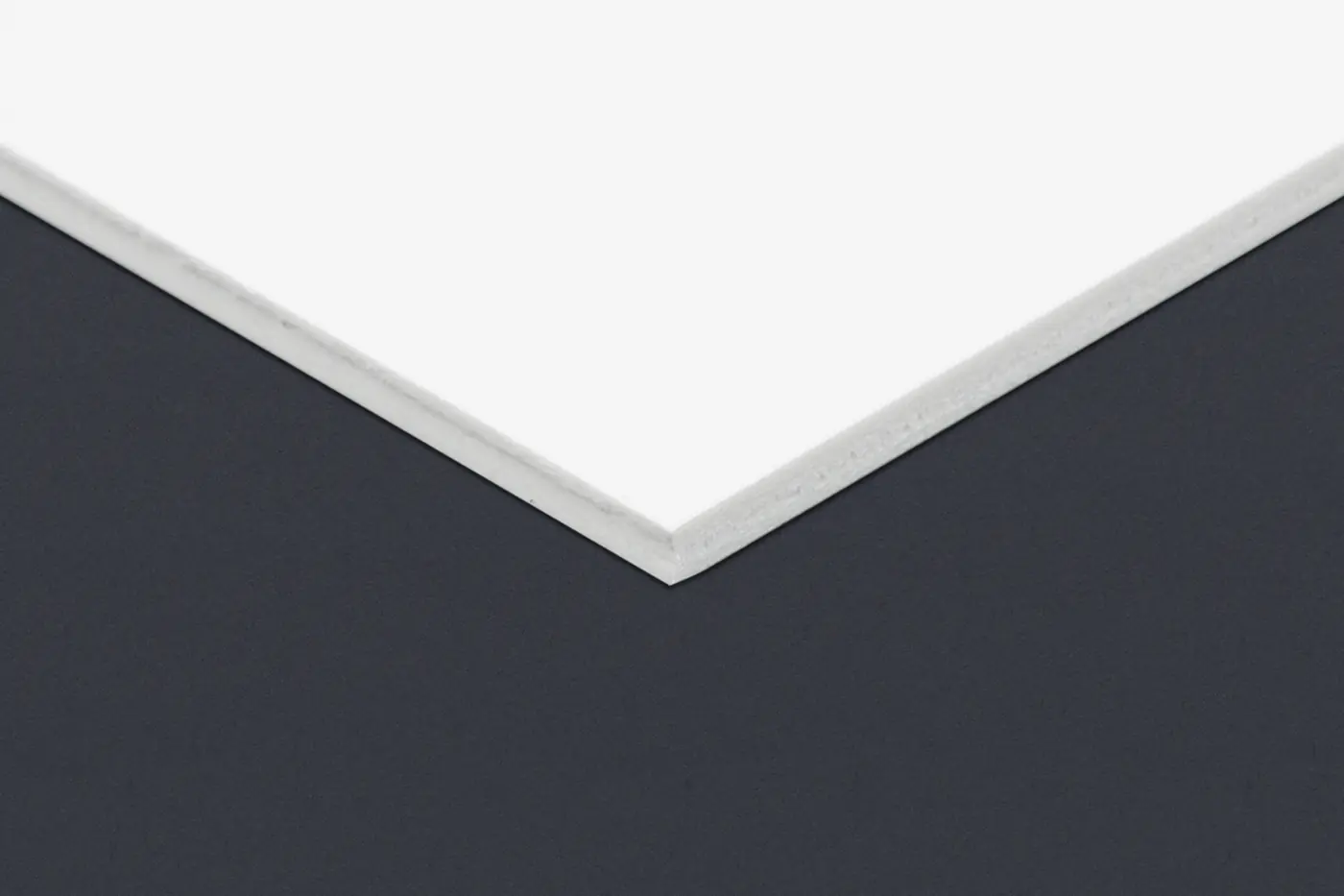 Foam Board Signs, 5mm board edge on dark background – printed by Buzz Media